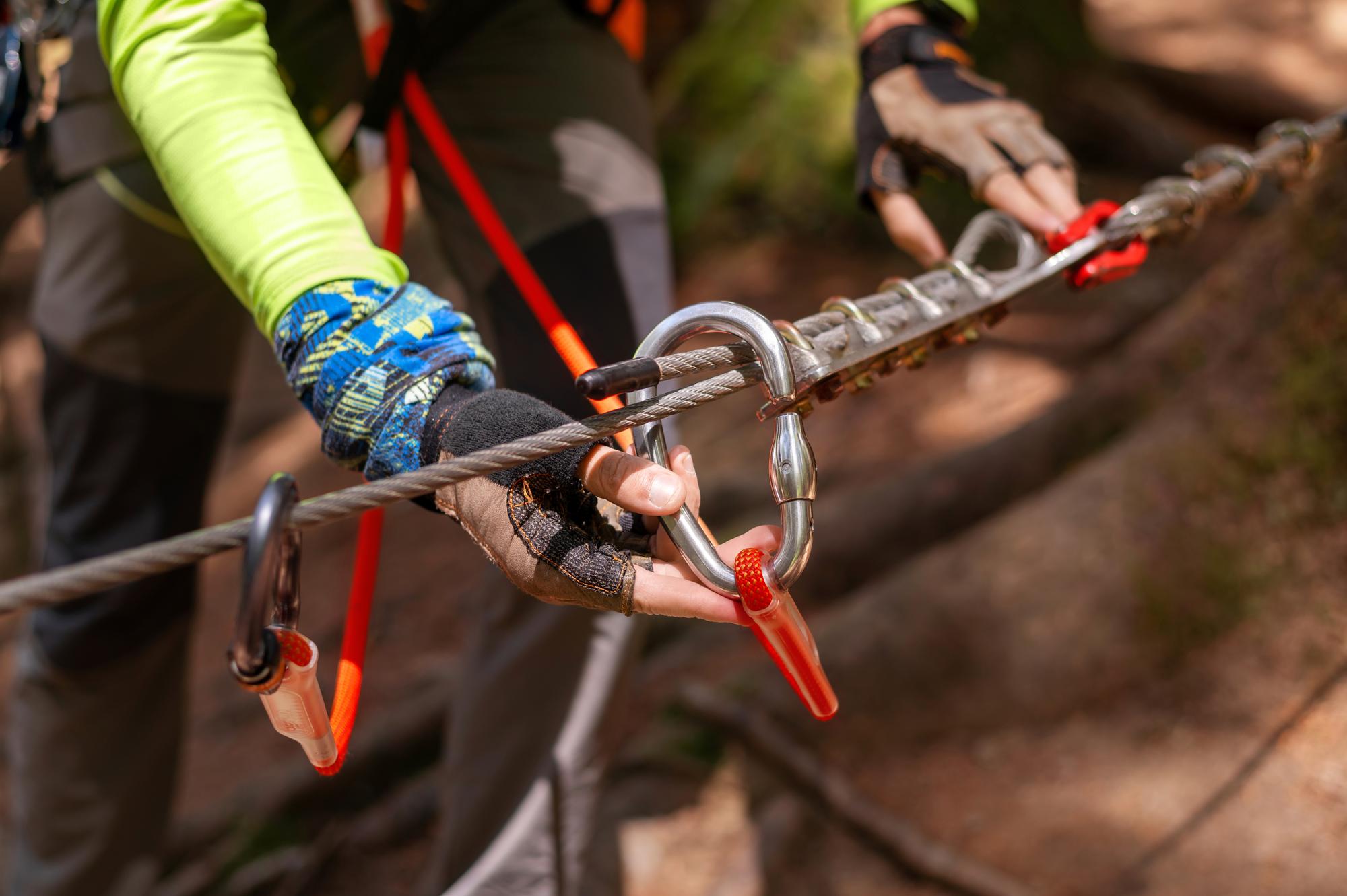 Carabiner and safety equipment used on a high-rope course